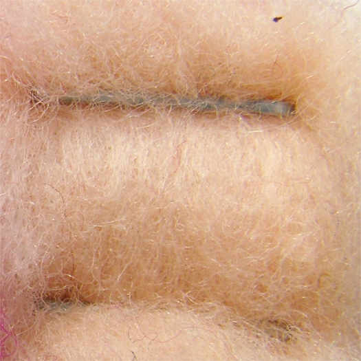 Merinowolle (bunt) - lachs hell extra fein im Vlies